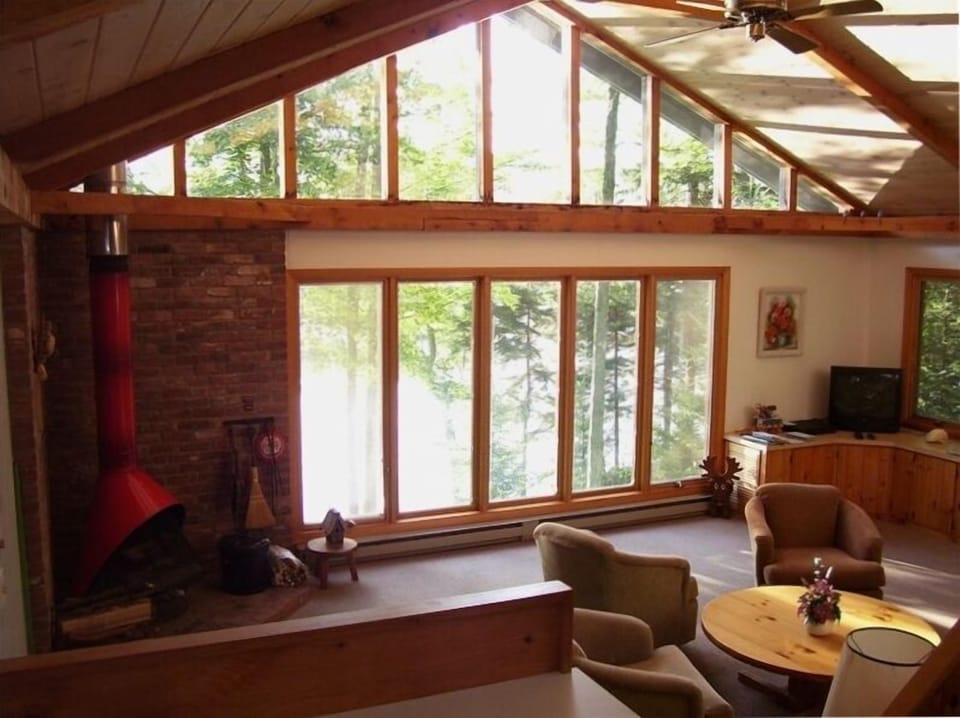 Enjoy the panoramic view of the water from the living room.