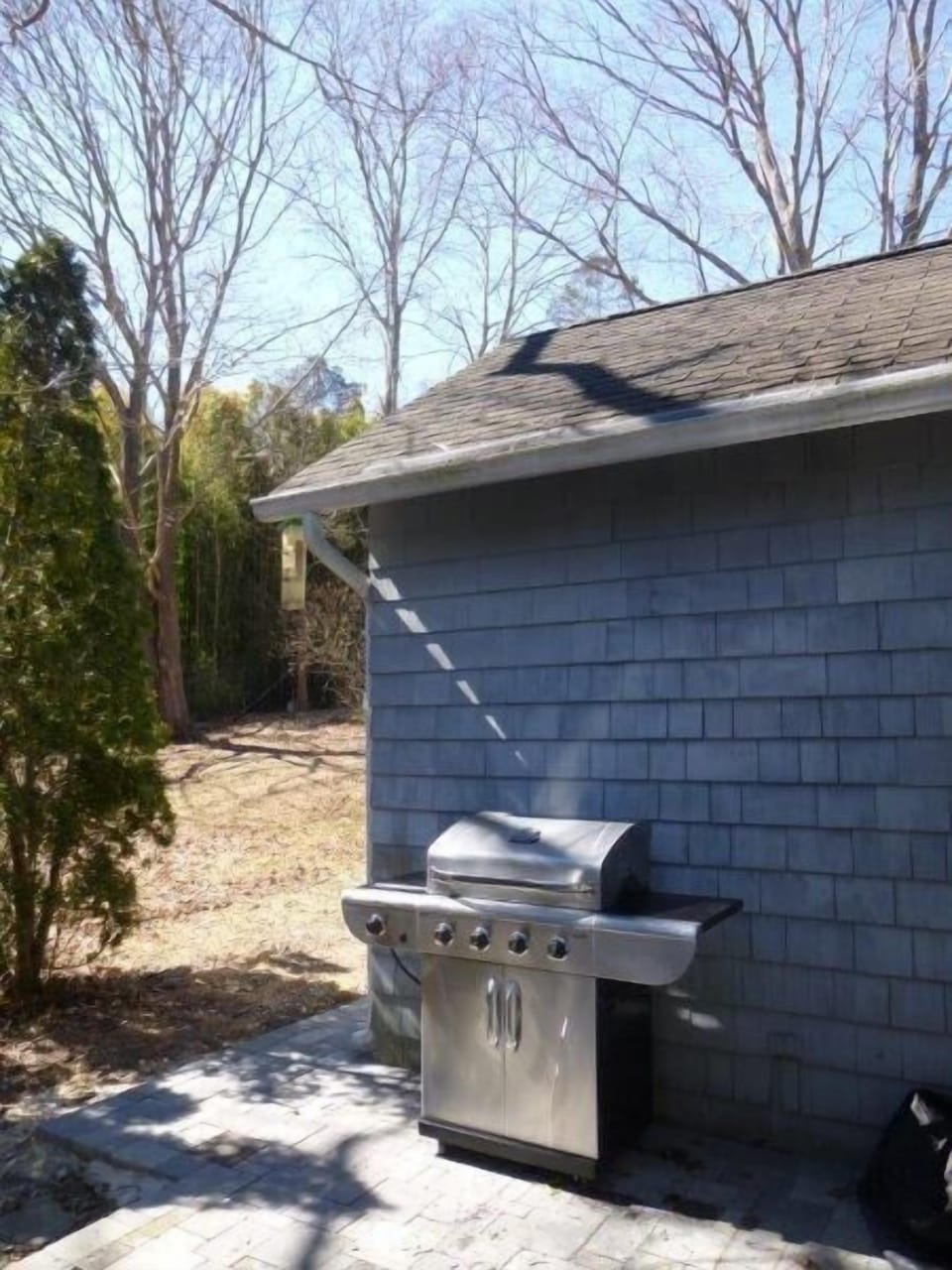 New 4 burner stainless gas grill with side burner