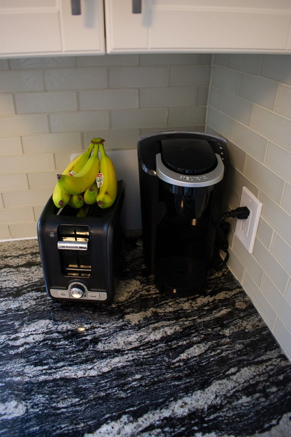 Toaster & Keurig...bananas not included. Cool granite counter hey! 