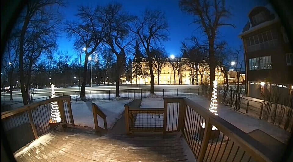 Front yard is nice in all seasons. Has a front deck to sit on. Partly fenced. 