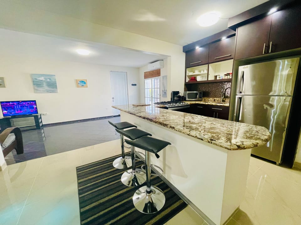 Full kitchen equipped with all you need for cooking. Part of second living area.