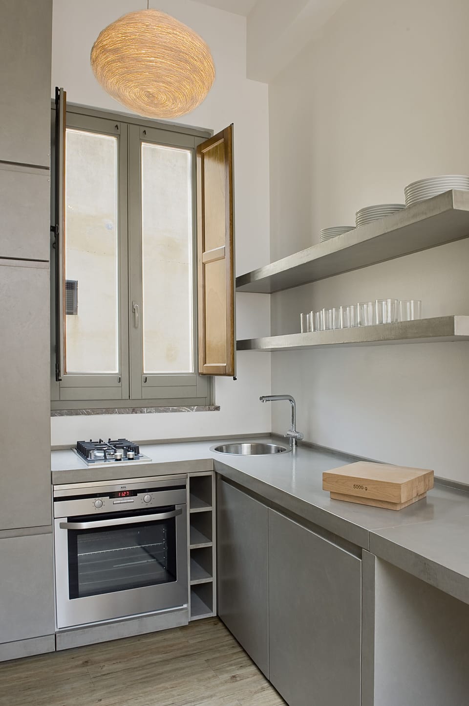 The kitchen corner consists of: stove, oven, dishwasher, refrigerator, freezer, 