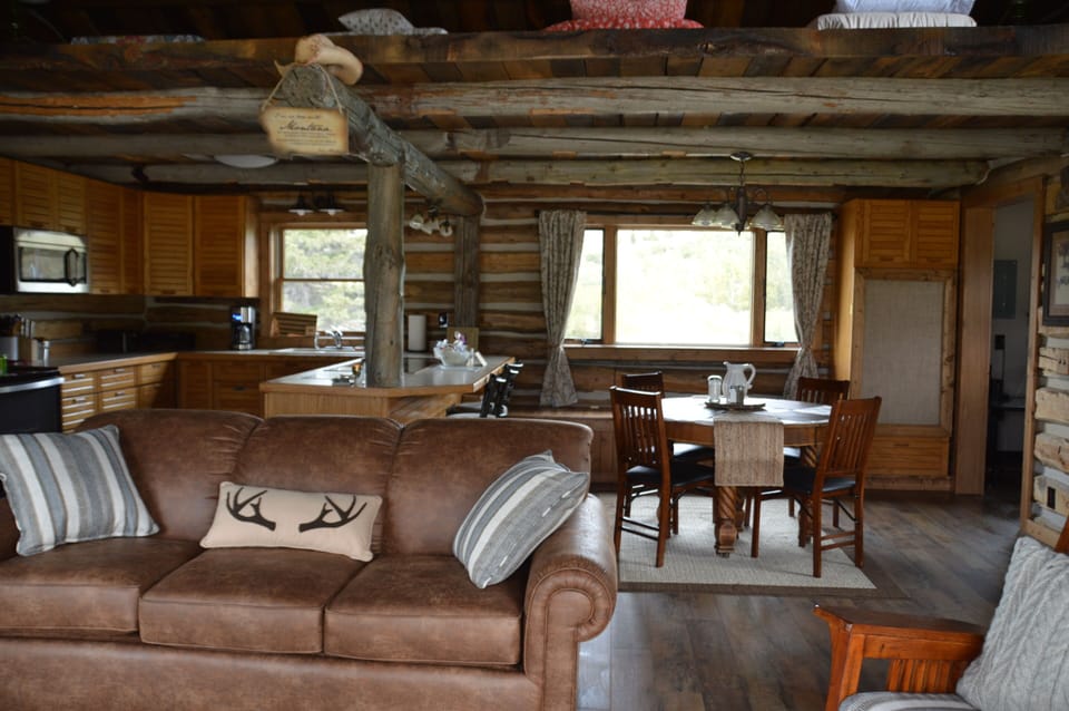 Open floor plan with kitchen, dining room, and living area.