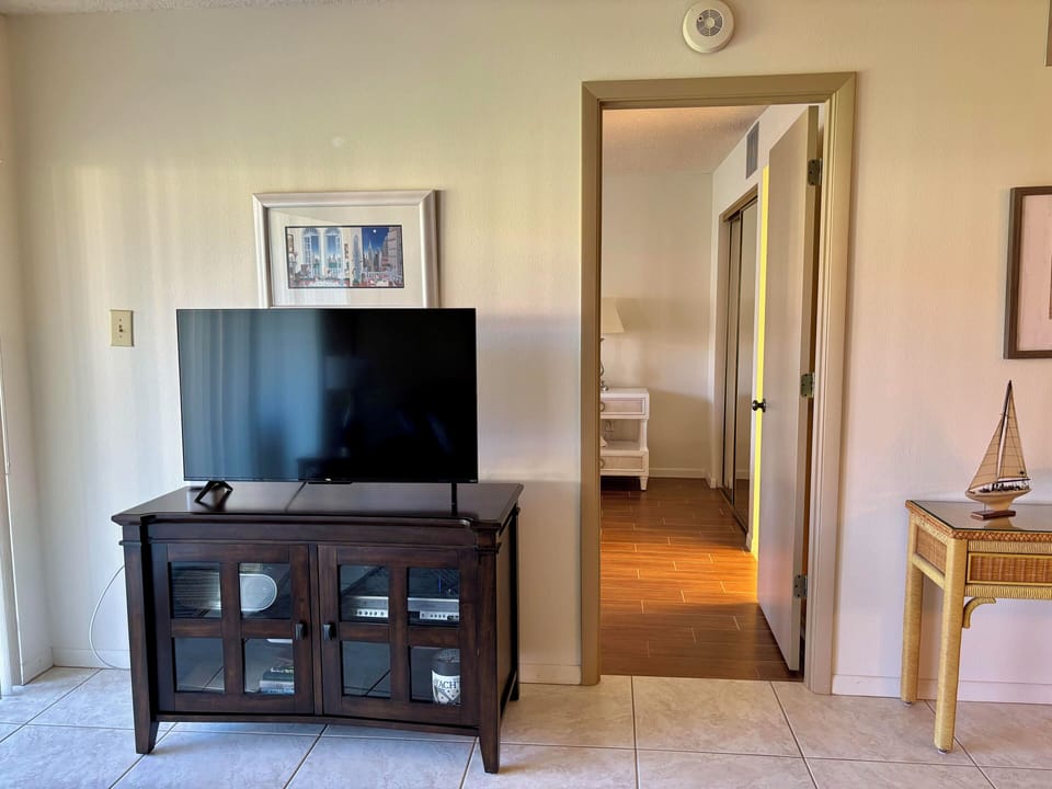 The living room has a smart tv