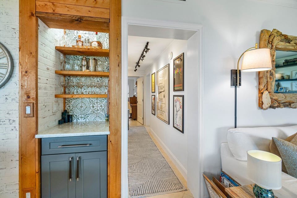 Built in bar leading to central hallway