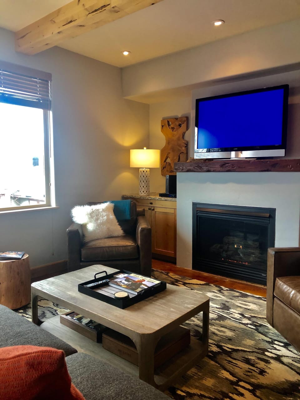 Watch  HD tv and stay cozy by the gas  fireplace....
