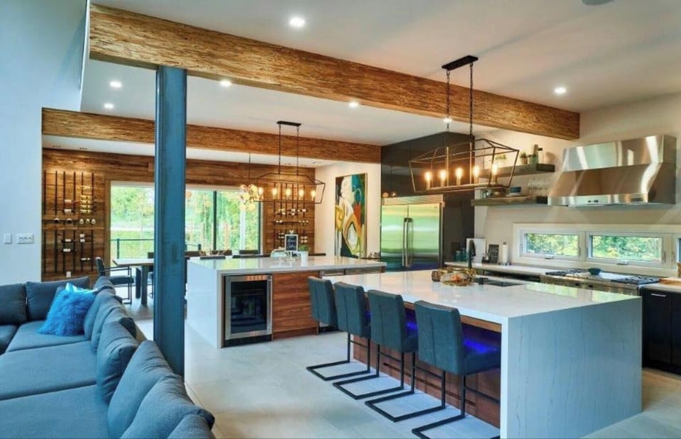 Two islands with two dishwashers and seating for eight 