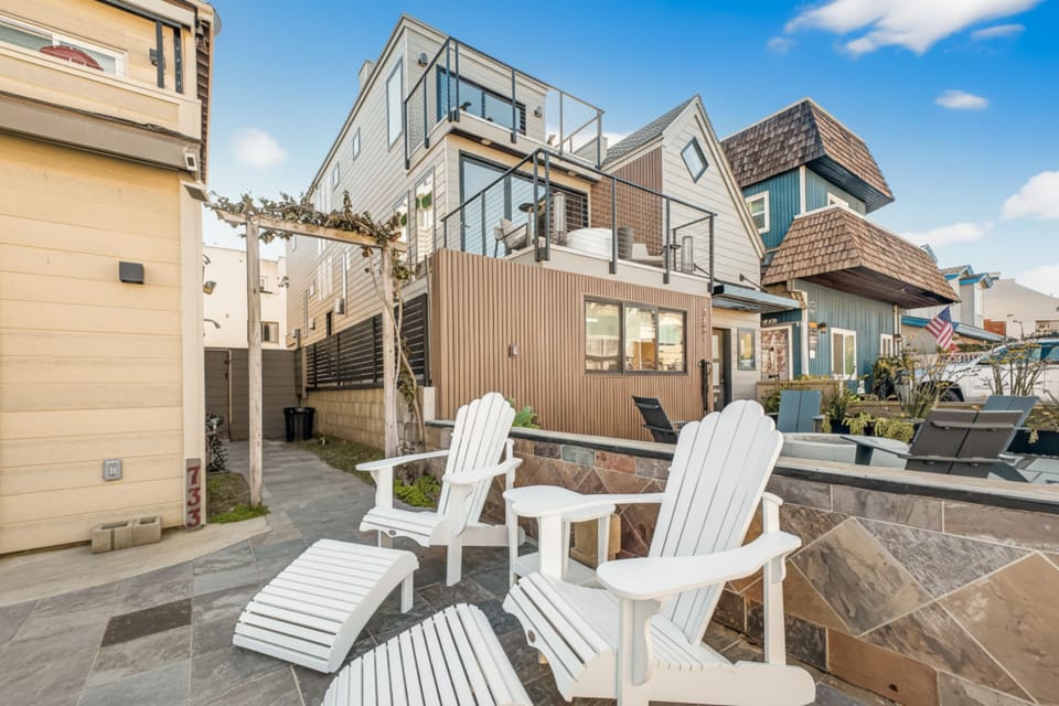 Relax and unwind with plenty of patio seating, perfect for family meals, outdoor gatherings, or enjoying sunny days near the beach.