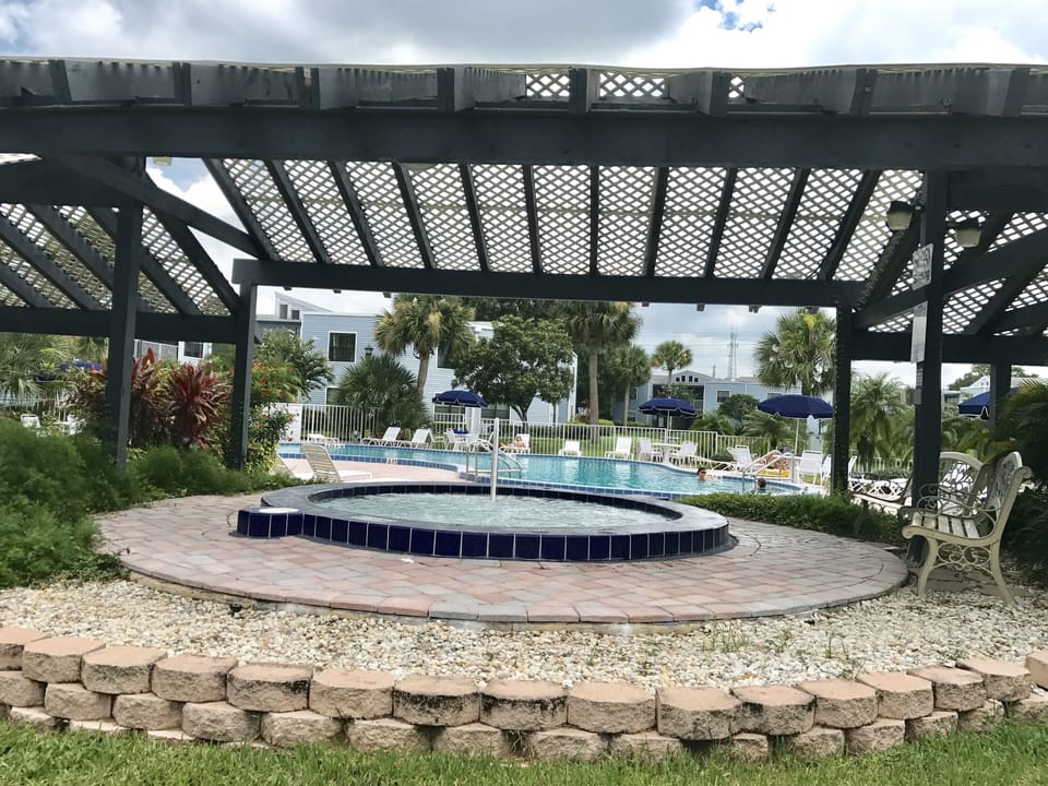 jacuzzi and 1 of the 2 pools(heated) at our sub-division below condo