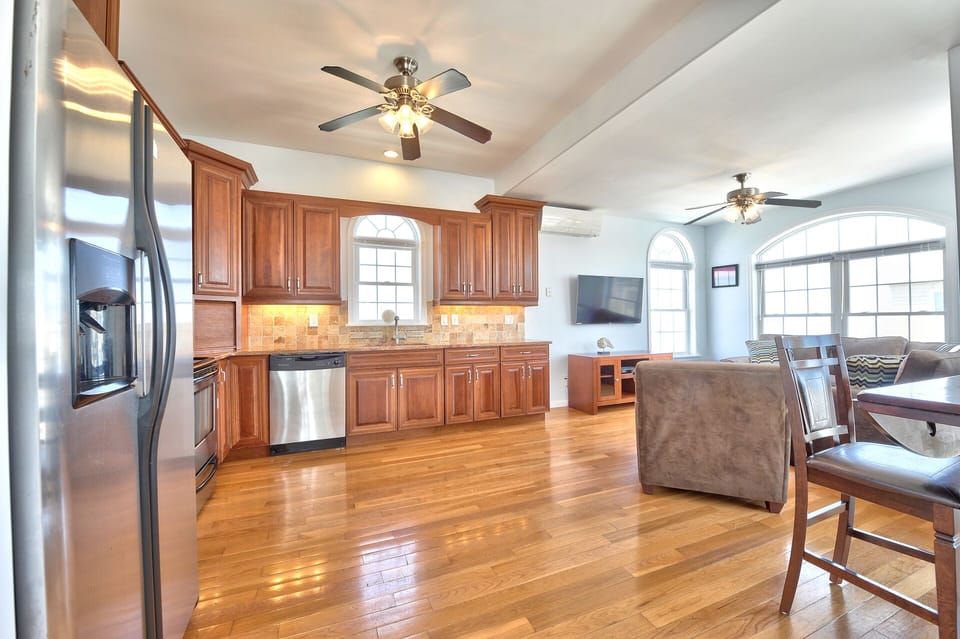 Open, reverse living floor plan with lots of windows to bring the outside in!