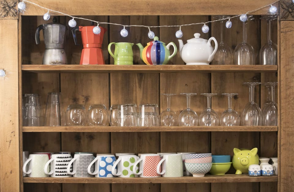 A traditional, well stocked dresser, finishes the room perfectly