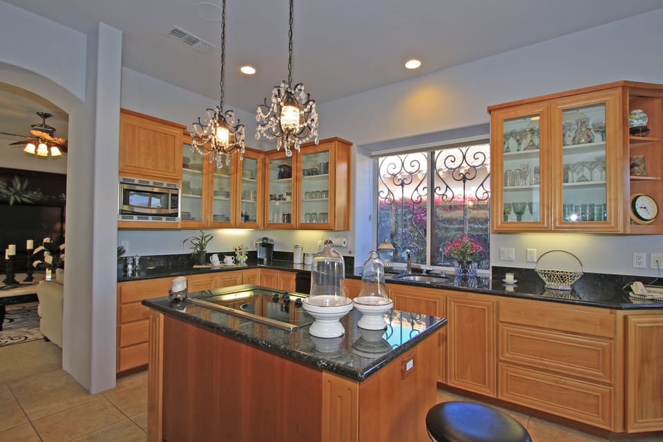 Gourmet Kitchen with Upgraded Stainless Steel Appliances and granite throughout