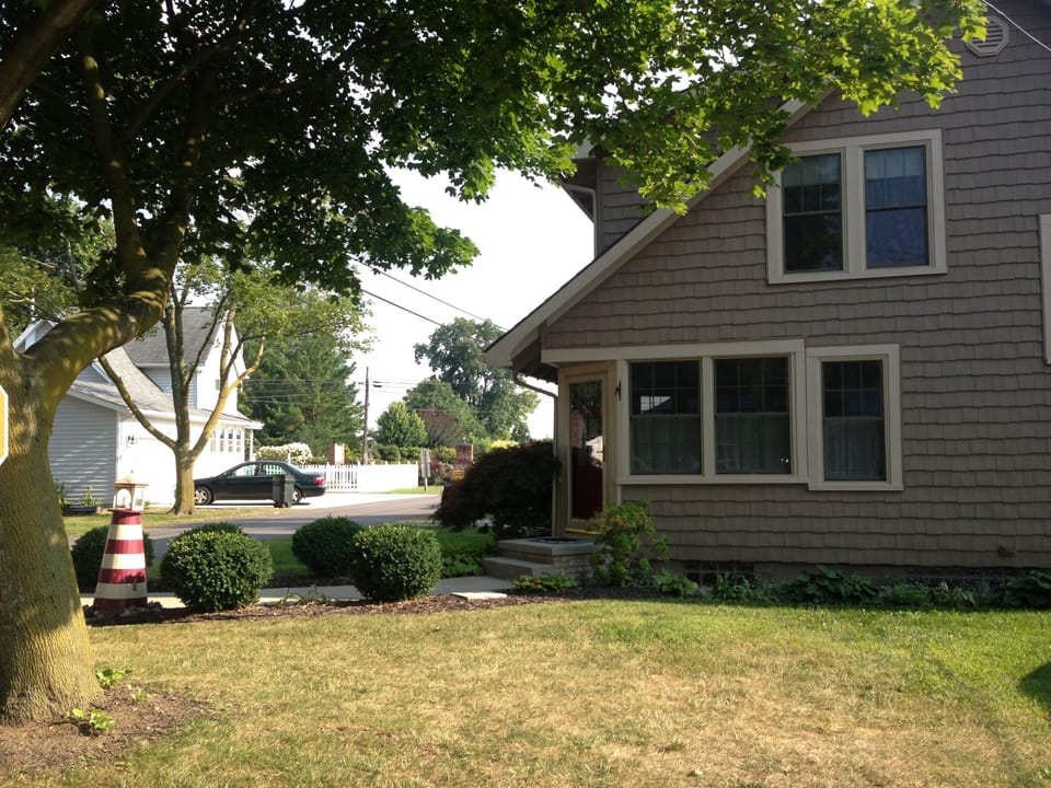 Roomy corner lot with  side yard for extra parking