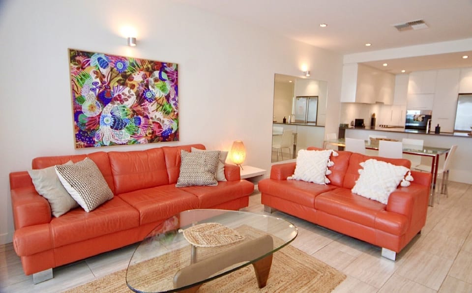 Open-plan dining space adjacent to the kitchen and living area, perfect for shared meals and socialising while enjoying ocean views.