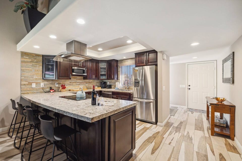 Lots of cabinets, counter space, and granite counter tops!