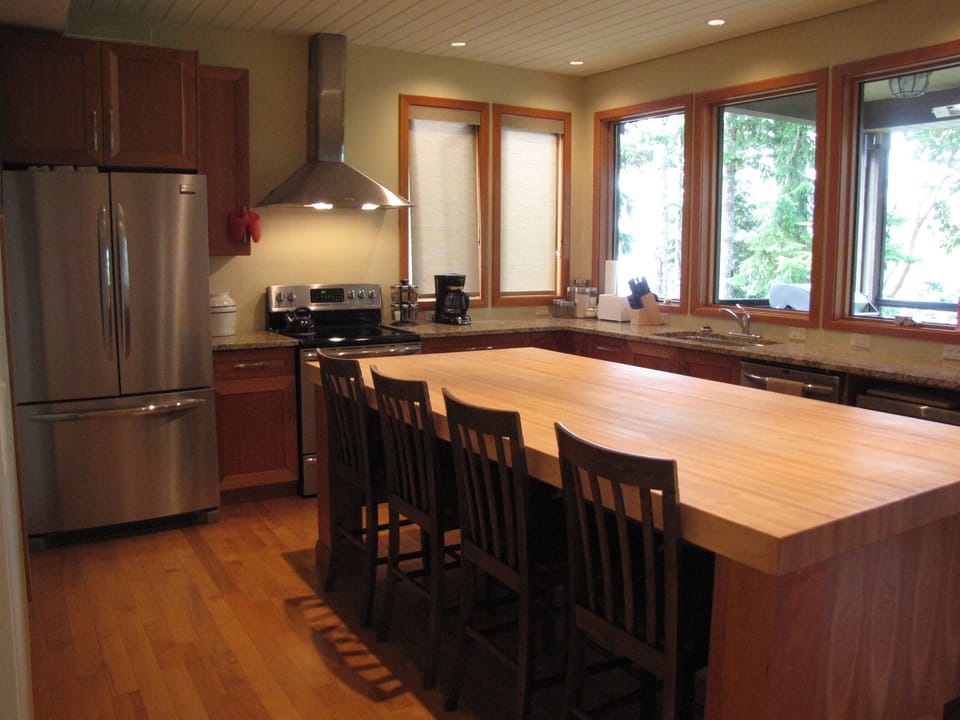 New stainless steel appliances & a gorgeous butcher block island that seats 4.