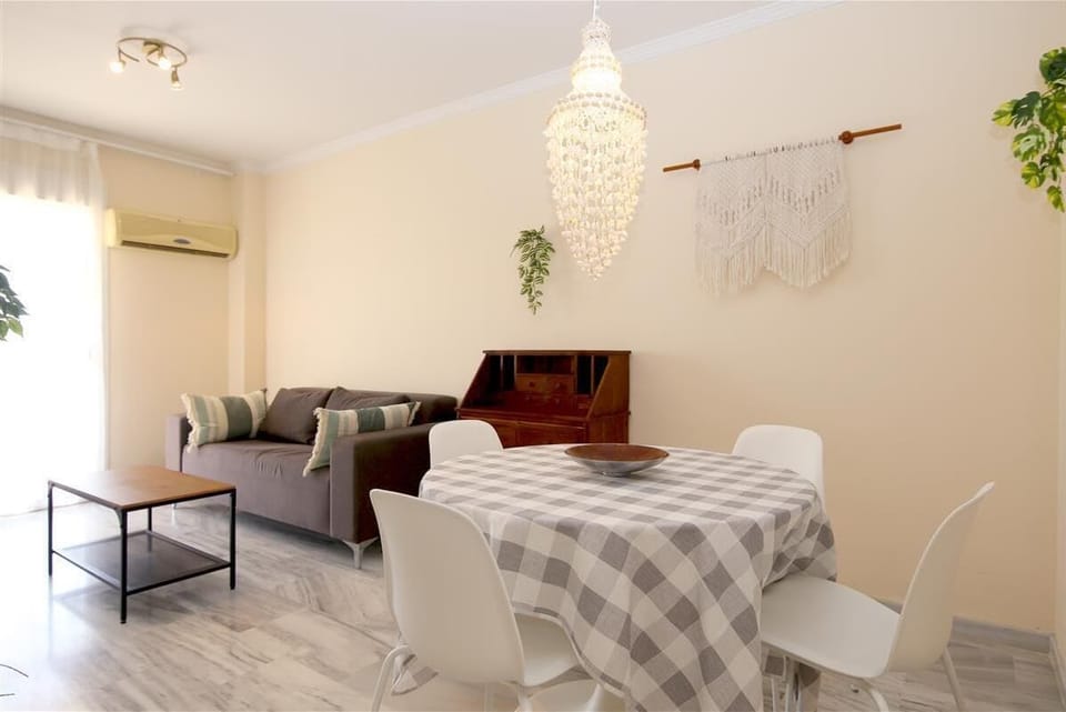 Full view of the lounge with air conditioning and dining area