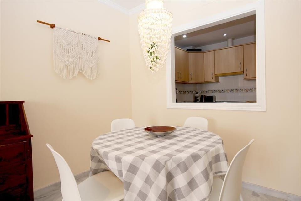 Dining area for four guests next to the kitchen
