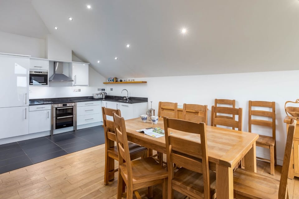 Kitchen dining area at By The Beach Widemouth Bay Cornwall