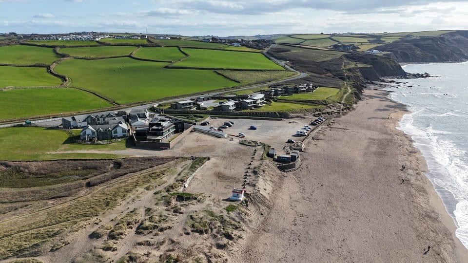 Aerial view of Widemouth Bay beach near By The Beach