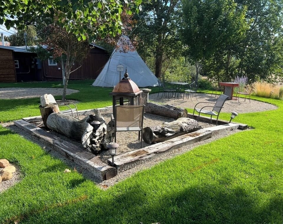 Side yard Tipi and fire pit area barbecue is next to Sundown cabin