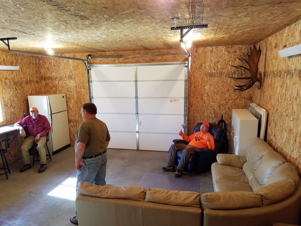 Heated garage for hunting dogs, gear, and suiting up.