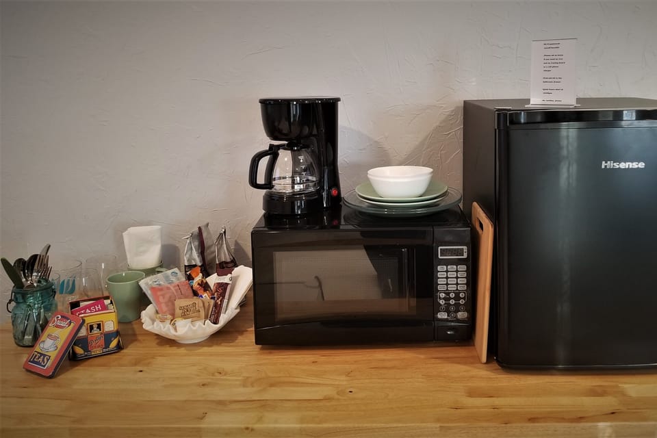 Microwave, Coffee maker, refrigerator.