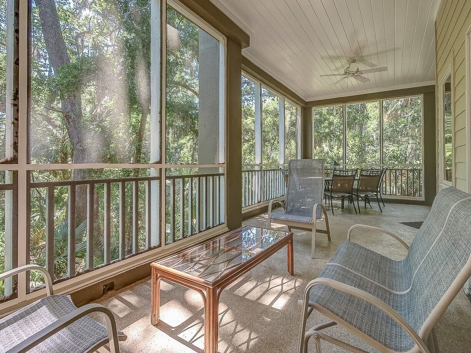 Sitting Area on Screen Porch at 8123 Wendover Dunes