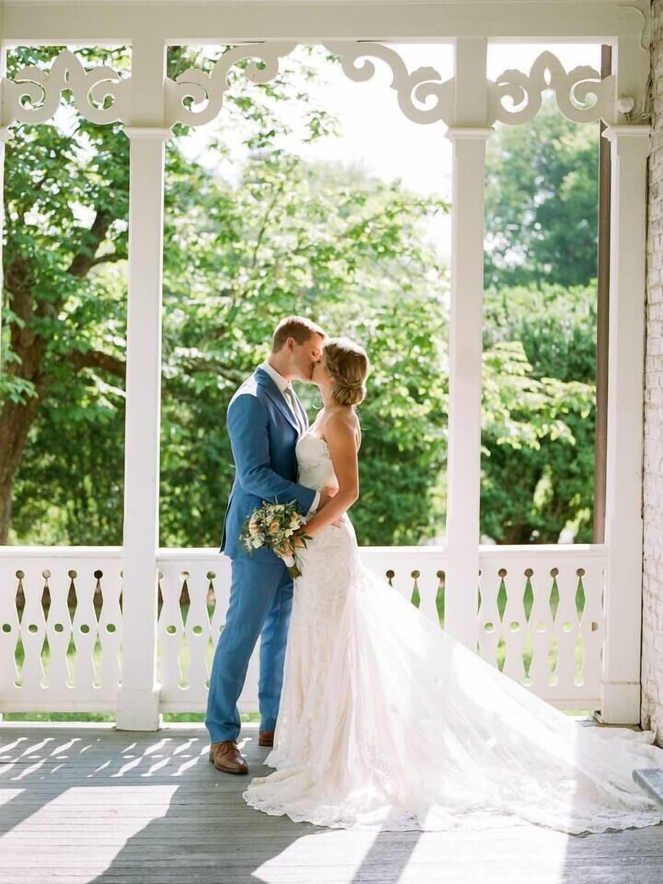 A romantic kiss on the porch