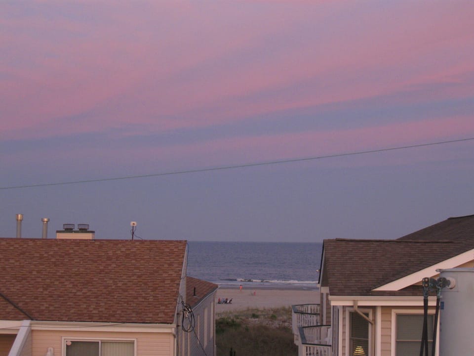 The best time to enjoy the roof deck or sit on the beach is at sunset. Magical!