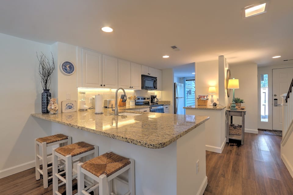 Kitchen and Kitchen Bar with Stools