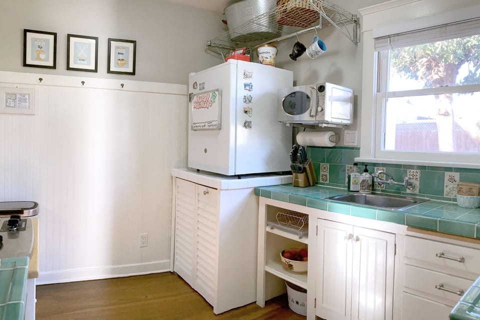 Your private kitchen includes half-fridge and all-in-one washer/dryer.
