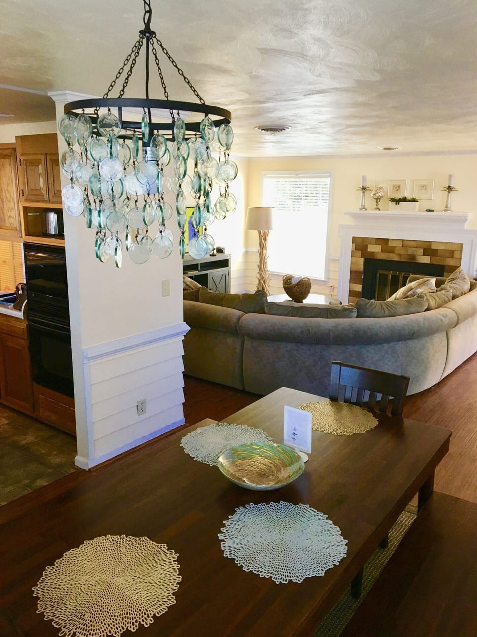 View of dining area with sitting area in background