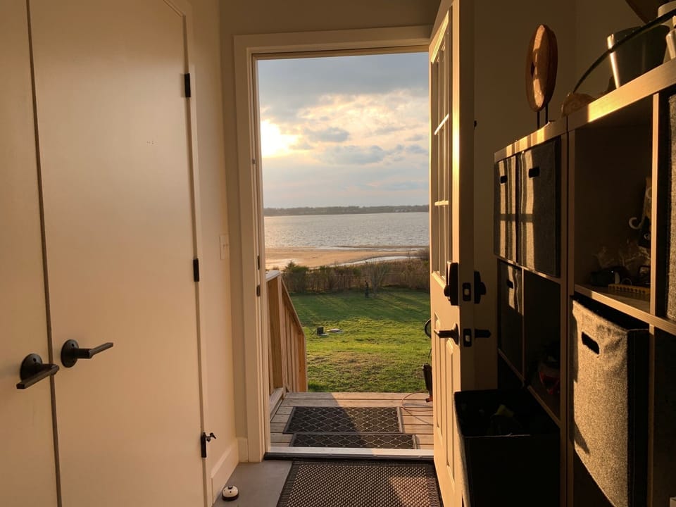 Back door from entry room, to gigantic back yard and access to beach