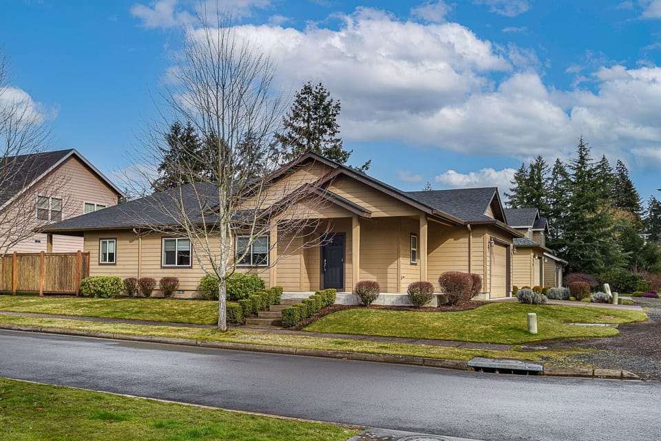 Main entrance. Home is on a corner lot.