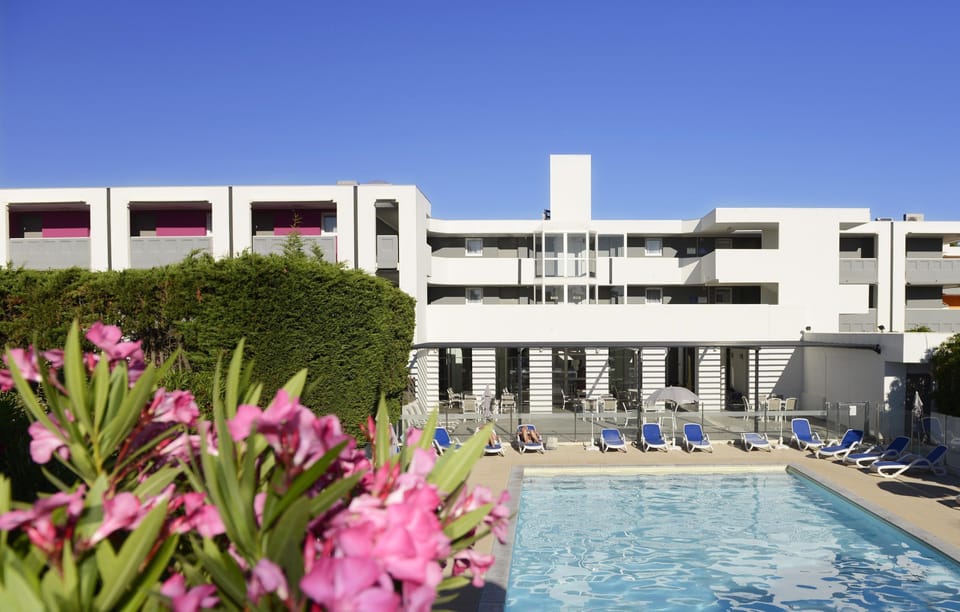 Dive into the gorgeous outdoor pool on a hot summer day.