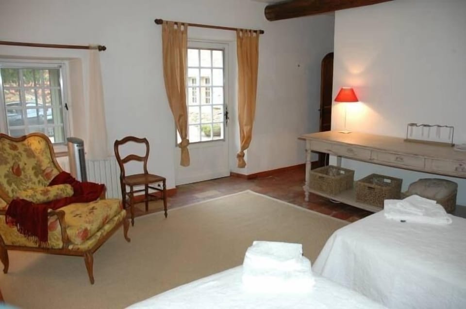 Downstairs bedroom opening to courtyard