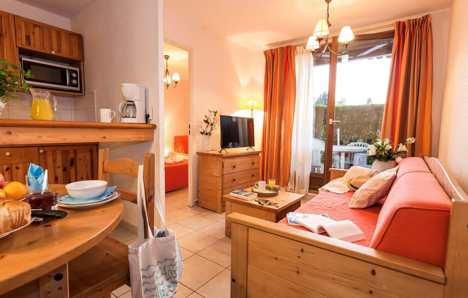 Sink into the cozy sofa after a day exploring the area.