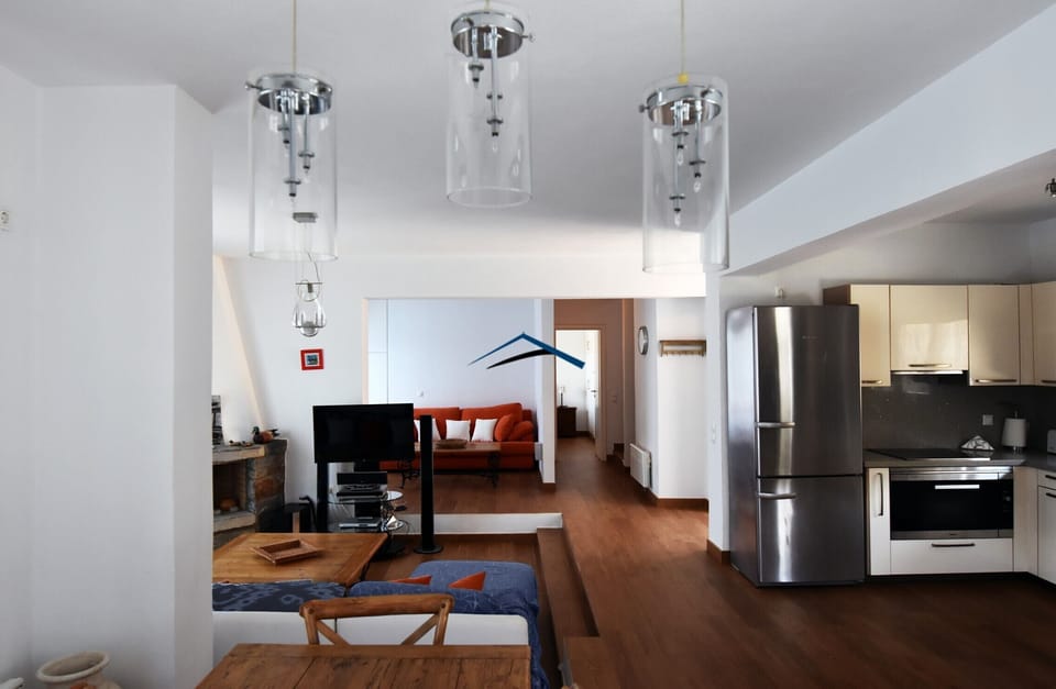 The view from the dining area of the living area and the kitchen