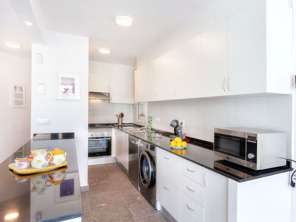 Property, Room, Kitchen, Furniture, Countertop, Cabinetry, Yellow, Building, Interior Design, Real Estate