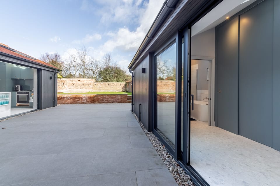 Ground floor: Sliding doors from the utility to courtyard
