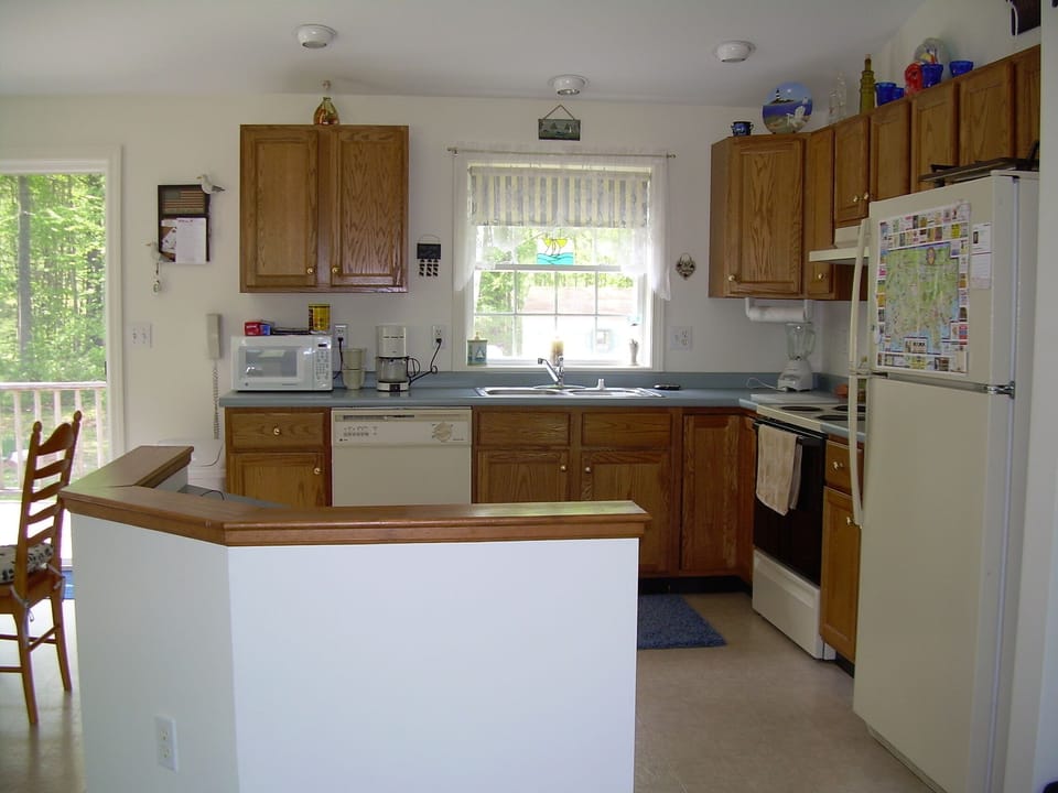 open concept kitchen/dining/living room