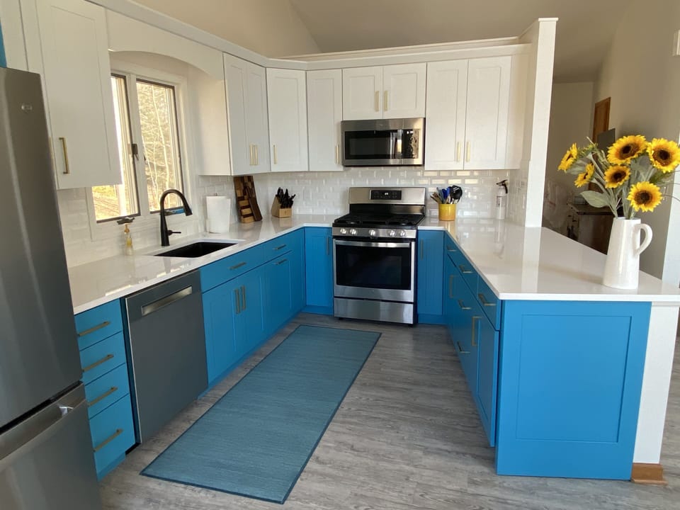 Renovated kitchen with new appliances.