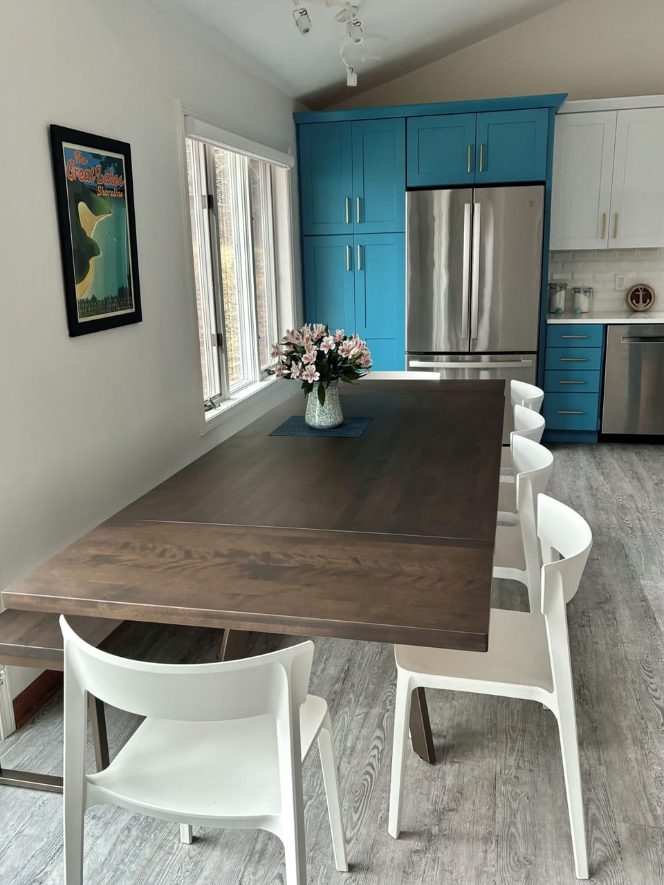 Solid wood table can easily sit eight. 