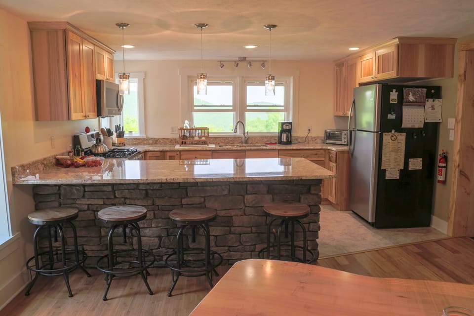 Stainless appliances, gas stove, huge granite counter space