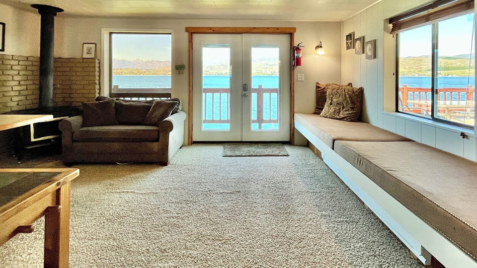 Twin daybeds and view out the living room windows