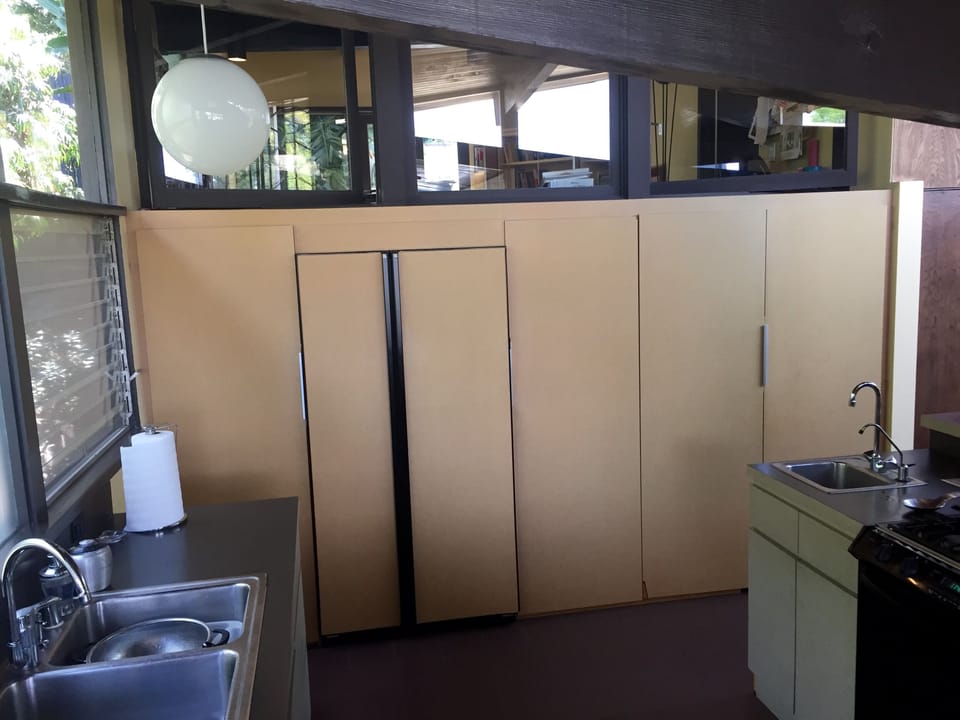 kitchen pantry, frig and laundry to right 