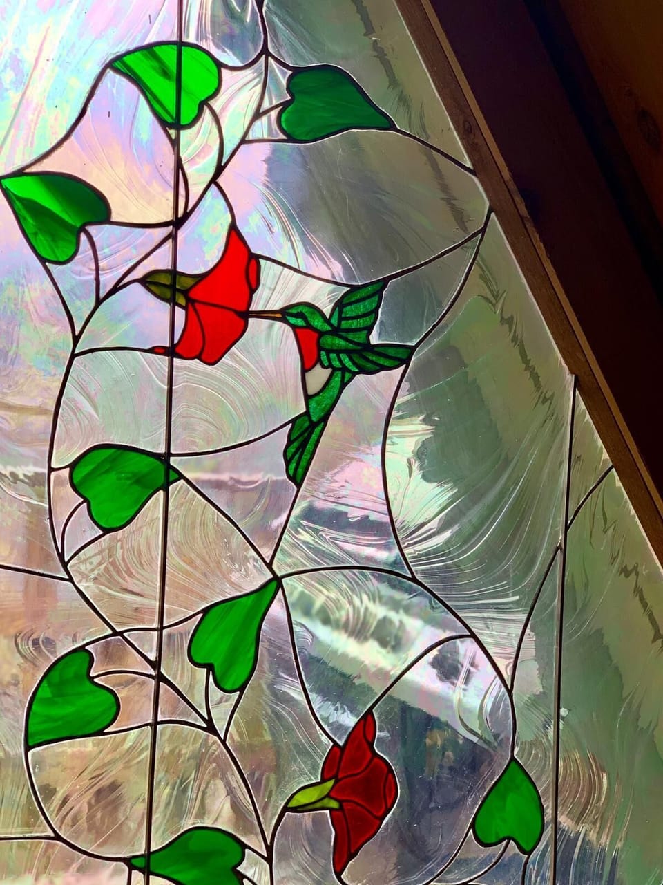 Charming hummingbird stained glass window