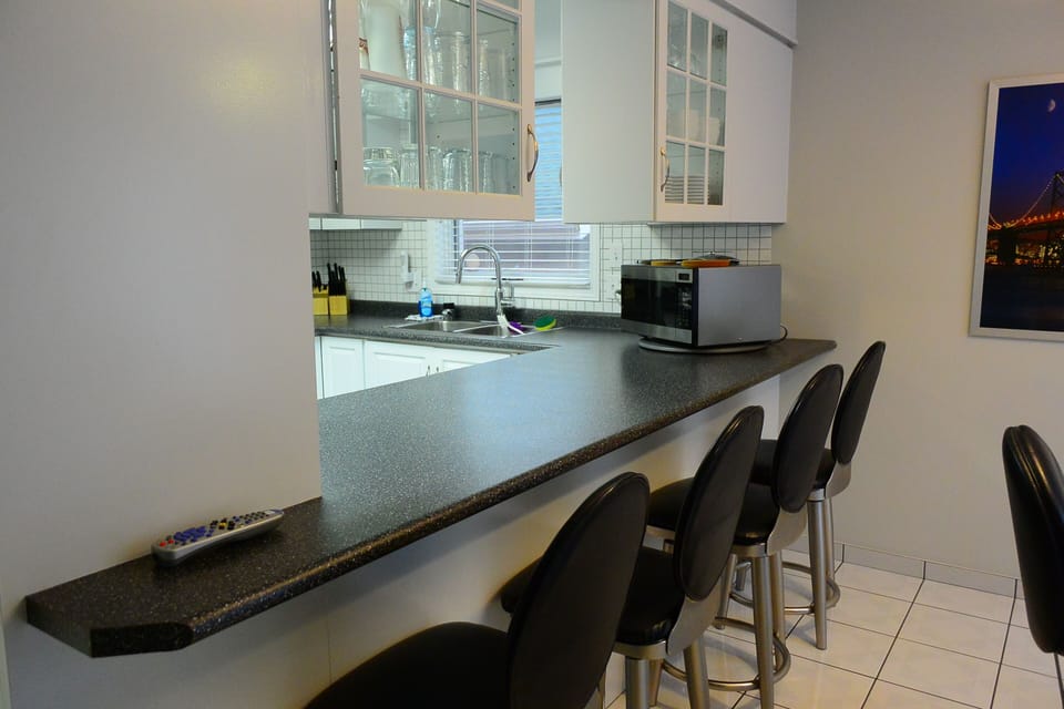 Breakfast bar looking into kitchen