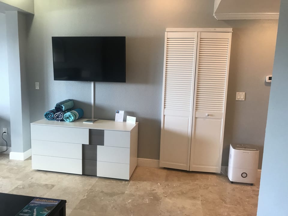 Flat screen cable TV in living area.